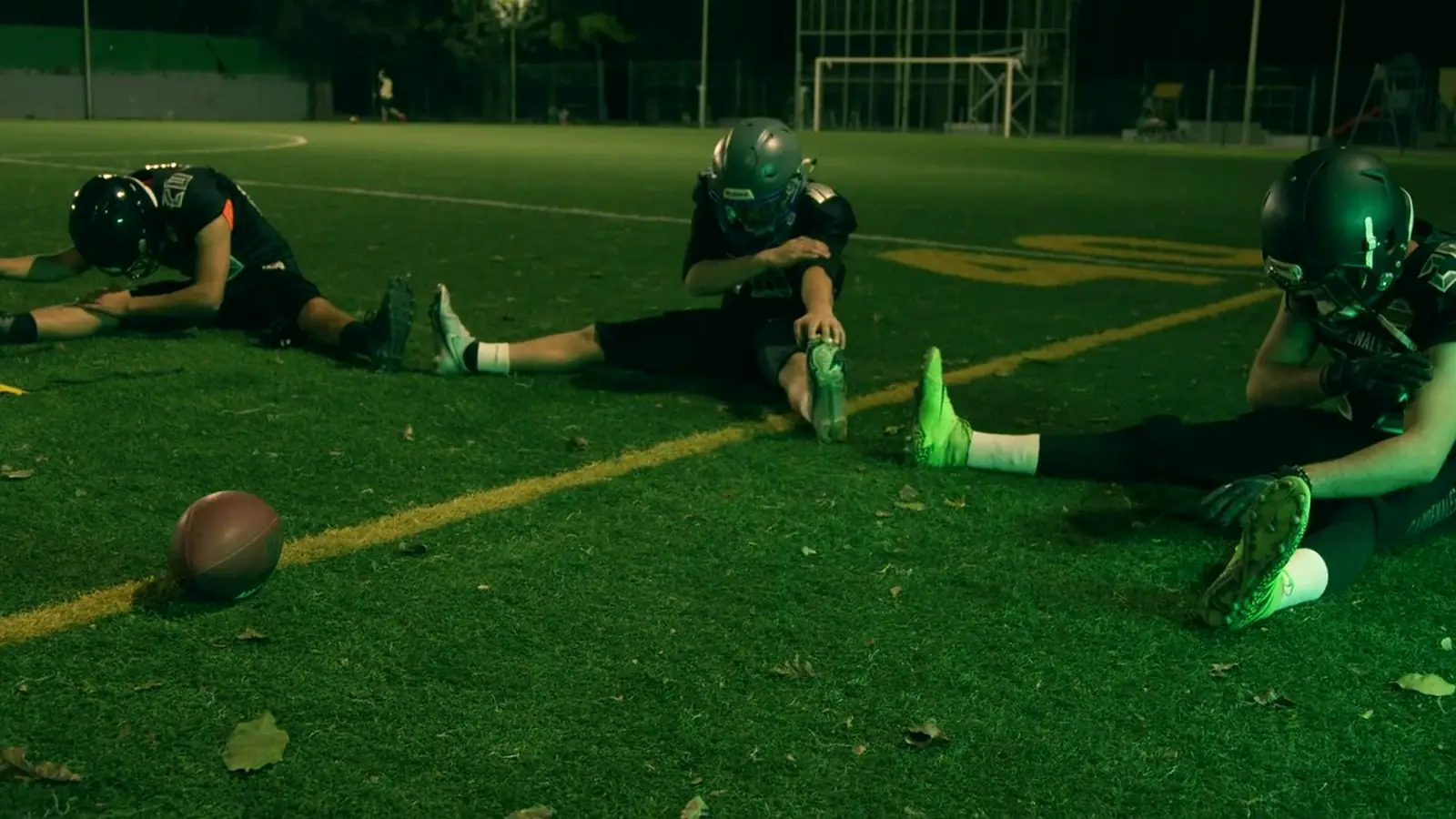 Football team warming up on the field before a game